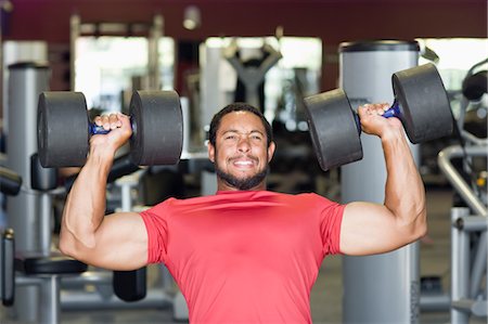 straining (overexertion) - Man Lifting Weights in Gym Foto de stock - Con derechos protegidos, Código: 700-03644546