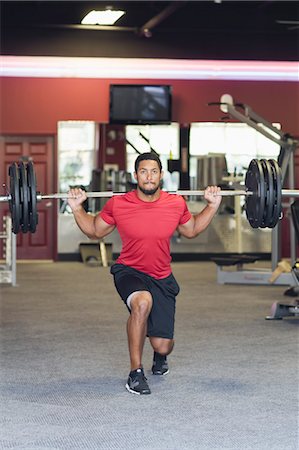 straining (overexertion) - Man Lifting Weights in Gym Foto de stock - Con derechos protegidos, Código: 700-03644548
