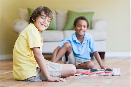 Boys Playing Checkers Stock Photo - Rights-Managed, Code: 700-03659108