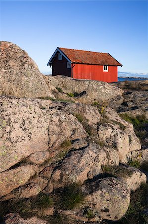 Red Wooden Hut on Rocky Coast, Bohuslaen, Sweden Foto de stock - Con derechos protegidos, Código: 700-03659271