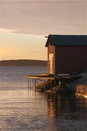 Boathouse at Sunrise, Bohuslaen, Sweden Stock Photo - Rights-Managed, Code: 700-03659273
