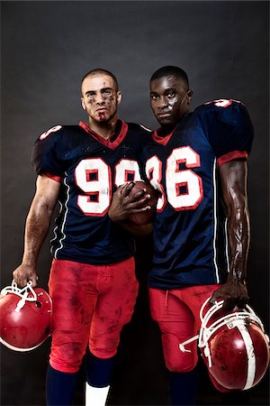 football (american ball) - Football Players in Studio Foto de stock - Con derechos protegidos, Código: 700-03698176