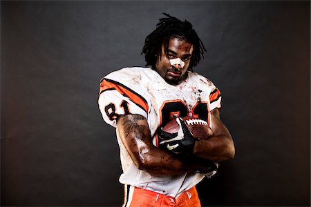 Portrait of Football Player with Bandage on Nose Foto de stock - Con derechos protegidos, Código: 700-03698188