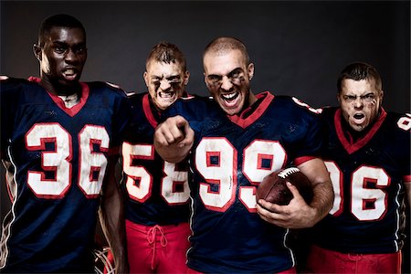 energetic young black people - Aggressive Football Players Stock Photo - Rights-Managed, Code: 700-03738355