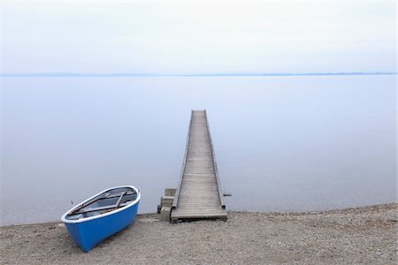 Boat and Dock, Lake Chiemsee, Bavaria, Germany Stock Photo - Rights-Managed, Code: 700-03738988