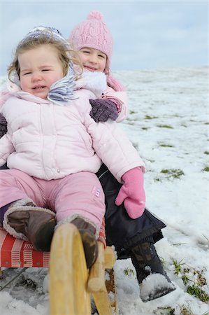 sleigh in the winter - Sisters on Sled Stock Photo - Rights-Managed, Code: 700-03739259