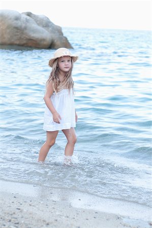 simsearch:700-03739271,k - Portrait of Girl Walking along Shoreline at Beach Stock Photo - Rights-Managed, Code: 700-03739282