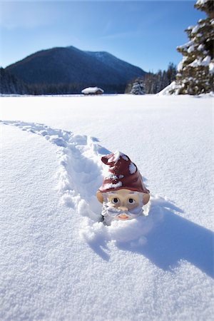 Garden Gnome in Deep Snow Stock Photo - Rights-Managed, Code: 700-03739367