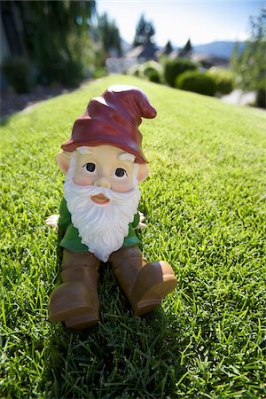 Garden Gnome on Lawn Stock Photo - Rights-Managed, Code: 700-03739370