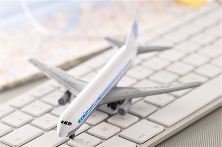 plan vacation - Model Airplane on Computer Keyboard Stock Photo - Rights-Managed, Code: 700-03766846