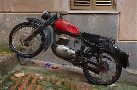flat - Old Motorcycle Parked on Hill Stock Photo - Rights-Managed, Code: 700-03777968