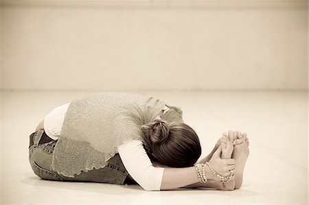 Woman in Sitting Forward Bend Stock Photo - Rights-Managed, Code: 700-03778090