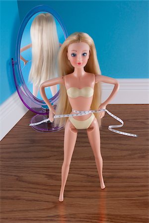 dolls - Doll Measuring Waist with Measuring Tape Stock Photo - Rights-Managed, Code: 700-03815233