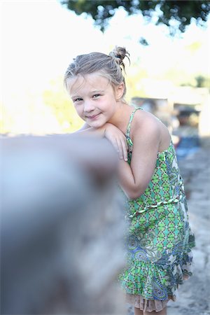 sundress - Portrait of Girl Leaning on Fence Stock Photo - Rights-Managed, Code: 700-03836239