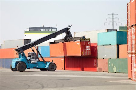 port shipping - Moving Shipping Containers at Dockyard Stock Photo - Rights-Managed, Code: 700-03836362