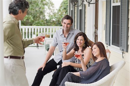 porch wicker - Group of Adults Drinking Wine Stock Photo - Rights-Managed, Code: 700-03891348