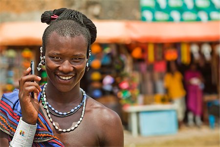 pictures of african traditional dresses - Masai Warrior Using Cell Phone Stock Photo - Rights-Managed, Code: 700-03893469