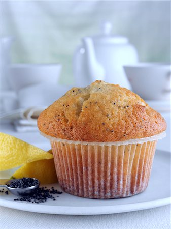 simsearch:824-07586191,k - Breakfast lemon and poppy seed muffin with leon wedges and tea set Stock Photo - Rights-Managed, Code: 824-07585988