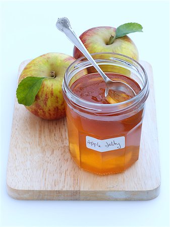 simsearch:824-07586124,k - A glass jar of apple jelly with whole apples behind Stock Photo - Rights-Managed, Code: 824-07586005