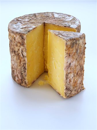 semi - Cave aged traditional cloth wrapped mature cheddar cheese Stock Photo - Rights-Managed, Code: 824-07586224