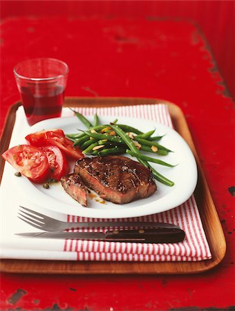 simsearch:825-06316883,k - Grilled entrecôte with tomatoes and green beans with almonds Stock Photo - Rights-Managed, Code: 825-05814521