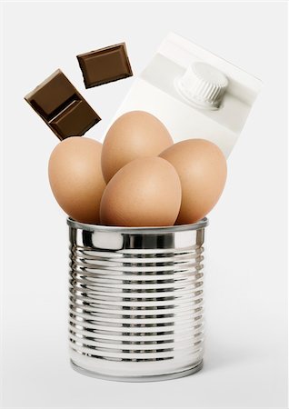 simsearch:825-06047612,k - Squares of chocolate,eggs and milk falling into a can Stock Photo - Rights-Managed, Code: 825-05815442