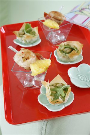simsearch:825-07649320,k - Flaky pastry starters with scallop brochettes Stock Photo - Rights-Managed, Code: 825-05815864