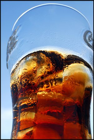 simsearch:825-02306931,k - Glass of cola with ice cubes Stock Photo - Rights-Managed, Code: 825-05815897