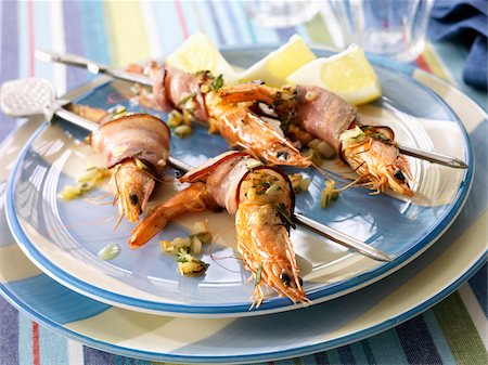 simsearch:825-05985428,k - Gambas wrapped in bacon on skewers Stock Photo - Rights-Managed, Code: 825-05836814