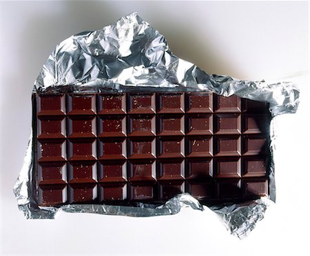simsearch:825-06047612,k - Bar of plain chocolate with foil wrapping Stock Photo - Rights-Managed, Code: 825-05985493
