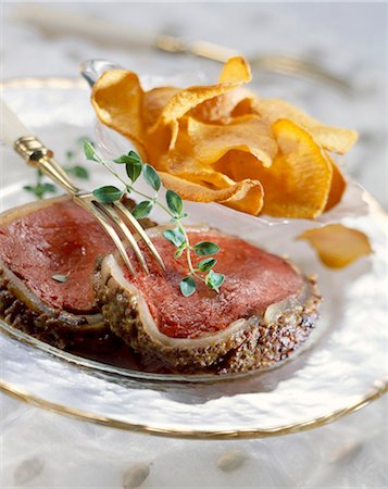 simsearch:825-05985428,k - Fillet of venison with mustard and sweet potato crisps Stock Photo - Rights-Managed, Code: 825-05986065