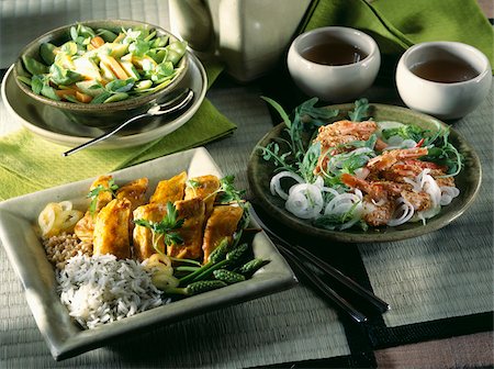 simsearch:825-02302497,k - Oriental meal with sautéed sesame seed prawns, caramelized chicken with wild asparagus,  baby vegetables Stock Photo - Rights-Managed, Code: 825-05986091