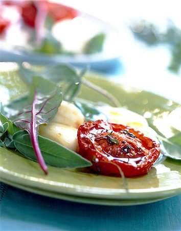 Preserved tomatoes with melted mozzarella Stock Photo - Rights-Managed, Code: 825-05986557