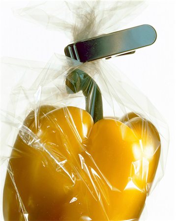 yellow pepper in plastic wrapping Stock Photo - Rights-Managed, Code: 825-05987338
