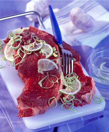 simsearch:825-05812193,k - Raw sirloin steaks Stock Photo - Rights-Managed, Code: 825-05987440