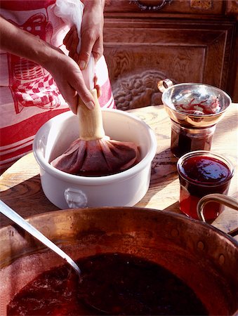 Preparing raspberry wine and wild strawberry jelly Stock Photo - Rights-Managed, Code: 825-05988042