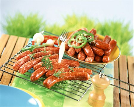 simsearch:825-05985428,k - Spicy Merguez sausages on rack Stock Photo - Rights-Managed, Code: 825-05988491