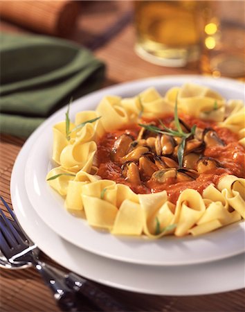 simsearch:825-07649320,k - Pappardelli pasta with mussels and tomato sauce Stock Photo - Rights-Managed, Code: 825-05988923