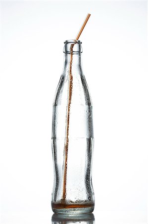 simsearch:825-02306931,k - Empty bottle of cola with straw Stock Photo - Rights-Managed, Code: 825-06046322