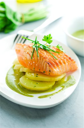 simsearch:825-07522119,k - Thick piece of salmon grilled on one side with sorrel sauce Stock Photo - Rights-Managed, Code: 825-06047215
