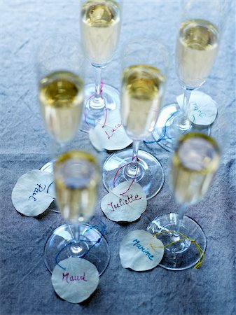 simsearch:825-05985931,k - Glasses of Champagne with white leaf name-tags Stock Photo - Rights-Managed, Code: 825-06049072