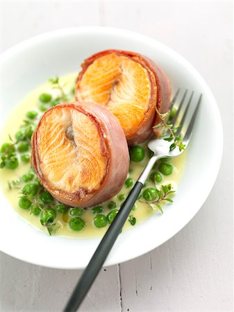 simsearch:825-07522119,k - Salmon steaks with raw ham,peas with thyme sauce Stock Photo - Rights-Managed, Code: 825-06049239