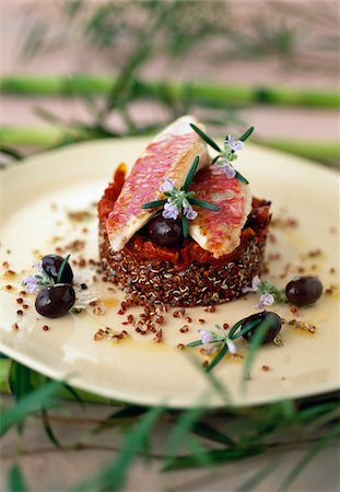 fish filet - Pan-fried red mullet filets with red quinoa and confit tomatoes Stock Photo - Rights-Managed, Code: 825-06315067