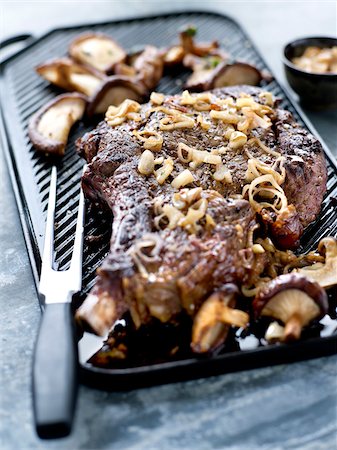 simsearch:825-05985428,k - Beef chop grilled with shallots and mushrooms Stock Photo - Rights-Managed, Code: 825-06315260