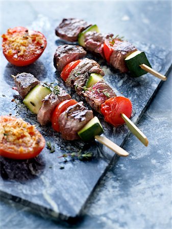 simsearch:825-06316883,k - Beef and vegetable brochettes and  provençal-style tomatoes Stock Photo - Rights-Managed, Code: 825-06315262