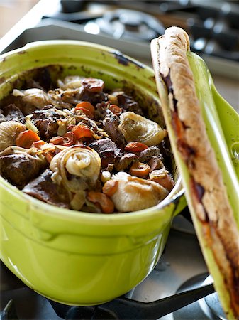 Beef,carrot and onion stew served in a casserole dish sealed with dough Stock Photo - Rights-Managed, Code: 825-06315327