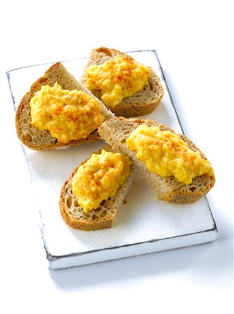 paprika - Scrambled eggs with paprika on sliced wholemeal bread Stock Photo - Rights-Managed, Code: 825-06316105