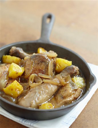 Guinea-fowl cooked with pineapple Stock Photo - Rights-Managed, Code: 825-06316504