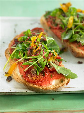 Tomatoes,mushrooms and mixed lettuce on toast Stock Photo - Rights-Managed, Code: 825-06316768