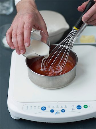 pulp - Adding the milk to the strawberry puree for the confectioner's custard Stock Photo - Rights-Managed, Code: 825-06815556